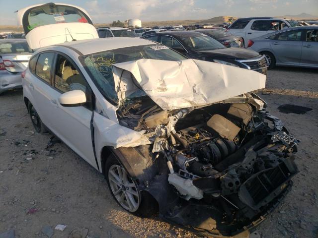 FORD FOCUS SE 2018 with VIN 1FADP3K2XJL212424 - Photo from auction