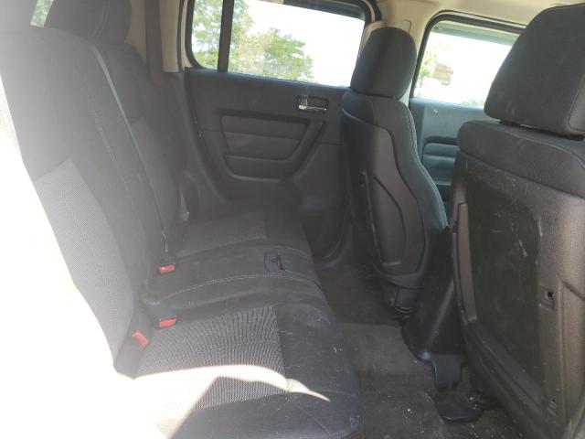 Photo 6 from auction – 2009 HUMMER H3 with VIN 5GTEN13EX98115989