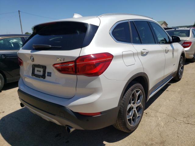 Photo 4 from auction – 2017 BMW X1 XDRIVE2 with VIN WBXHT3C37H5F81874