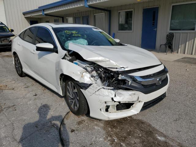 HONDA CIVIC EX 2018 with VIN 19XFC2F77JE024936 - Photo from auction