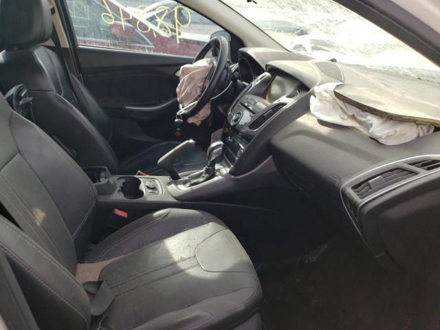 Photo 5 from auction – 2014 FORD FOCUS TITA with VIN 1FADP3J23EL399545