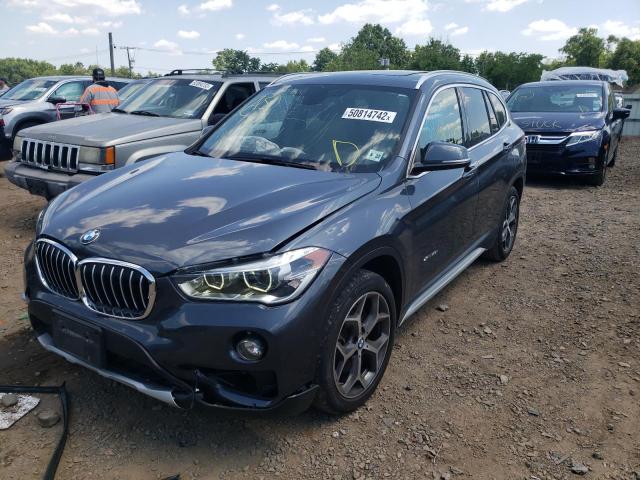 Photo 2 from auction – 2017 BMW X1 XDRIVE2 with VIN WBXHT3C39H5F70181