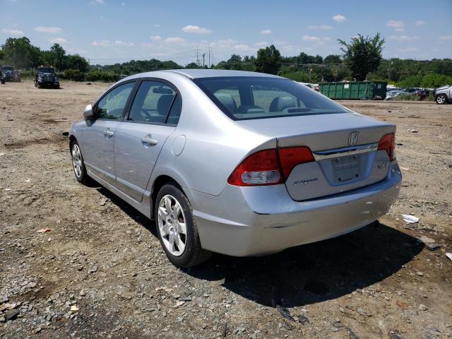 Photo 3 from auction – 2011 HONDA CIVIC LX with VIN 19XFA1F5XBE037647