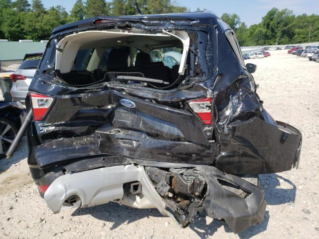 Photo 9 from auction – 2018 FORD ESCAPE TIT with VIN 1FMCU9J94JUD11763