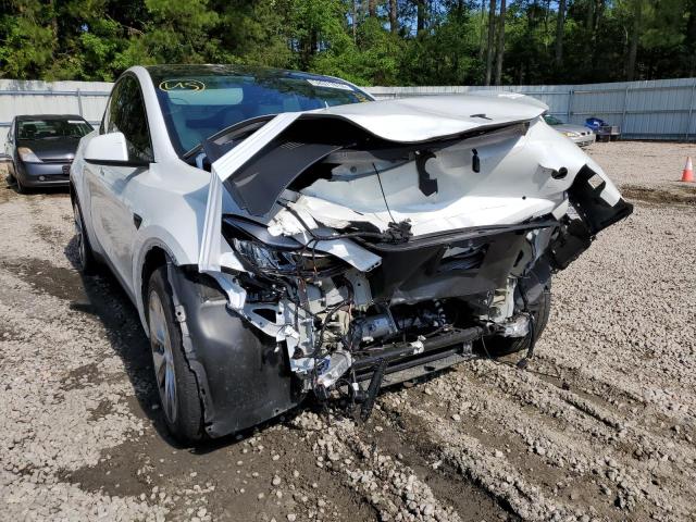 Photo 9 from auction – 2021 TESLA MODEL Y with VIN 5YJYGDEE6MF114151