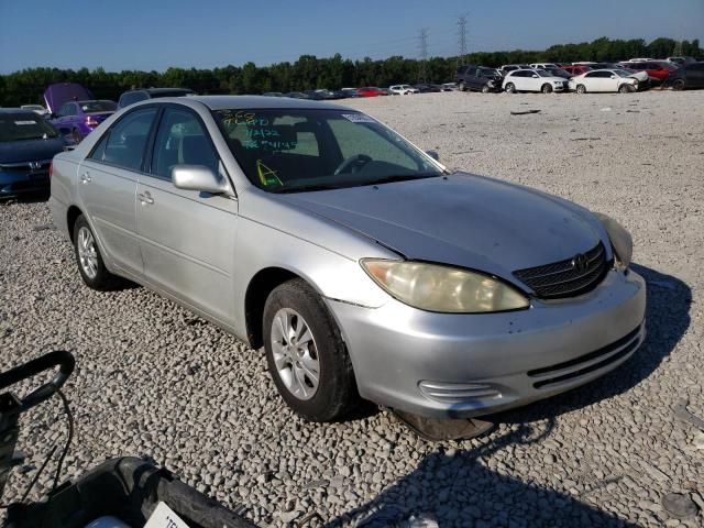 TOYOTA CAMRY LE 2004 with VIN 4T1BF32K94U570175 - Photo from auction
