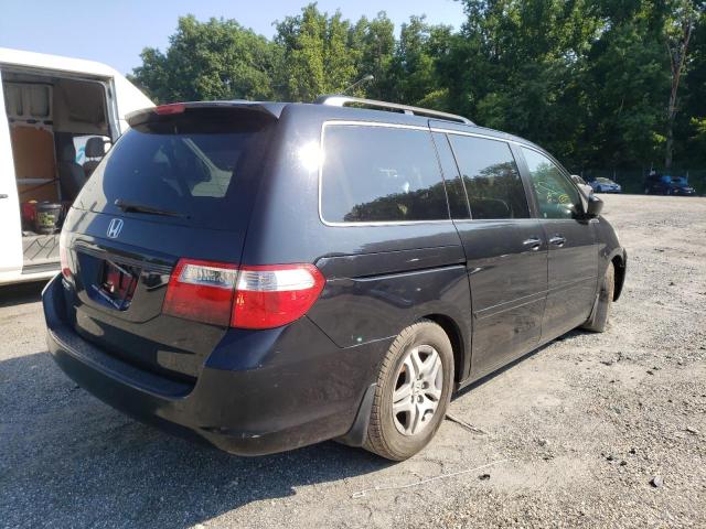 Photo 4 from auction – 2006 HONDA ODYSSEY EX with VIN 5FNRL38746B068653