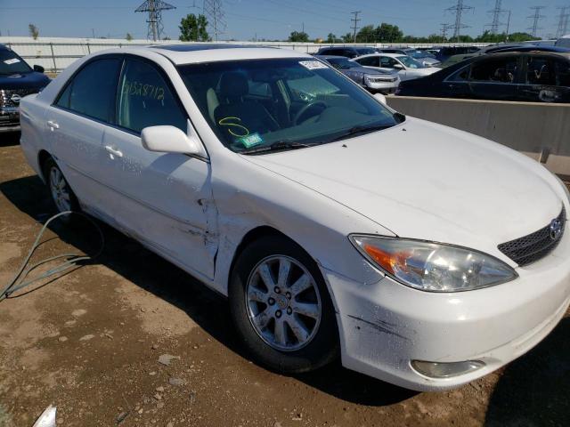 Photo 9 from auction – 2004 TOYOTA CAMRY LE with VIN 4T1BF30K34U075067