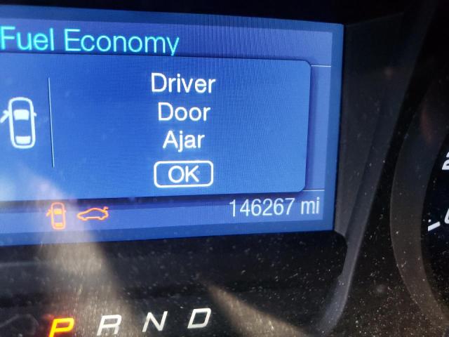 Photo 8 from auction – 2013 FORD TAURUS POL with VIN 1FAHP2M88DG213310