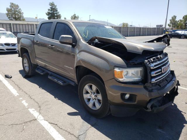 GMC CANYON SLE 2016 with VIN 1GTG5CE37G1100928 - Photo from auction