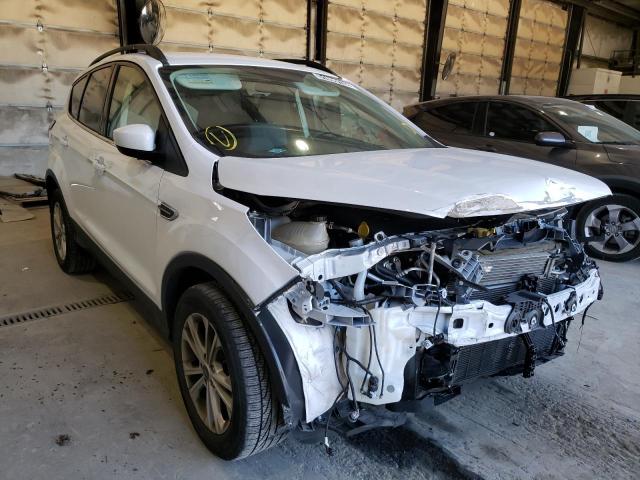 FORD ESCAPE SE 2018 with VIN 1FMCU9GD1JUC38329 - Photo from auction