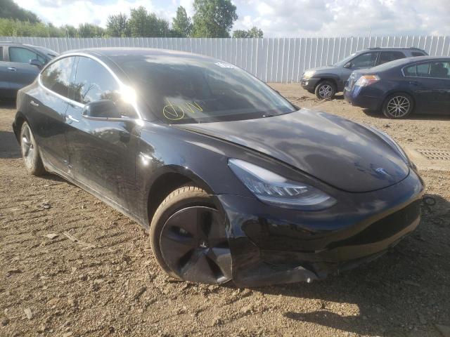 TESLA MODEL 3 2018 with VIN 5YJ3E1EBXJF067996 - Photo from auction