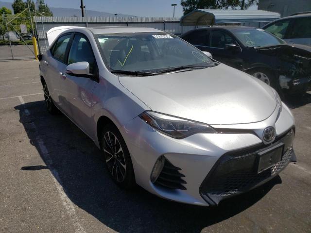 TOYOTA COROLLA L 2017 with VIN 5YFBURHE6HP633380 - Photo from auction
