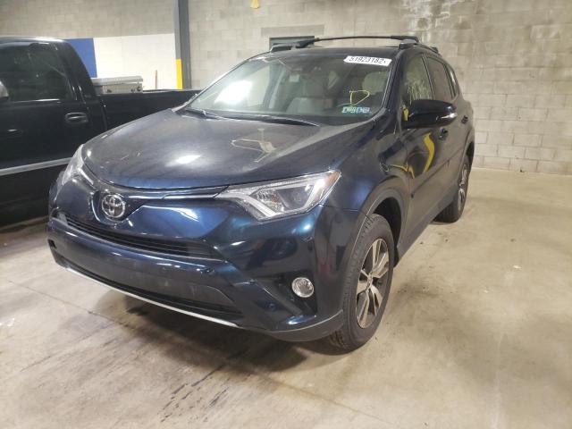 Photo 2 from auction – 2017 TOYOTA RAV4 XLE with VIN JTMRFREV0HJ160898