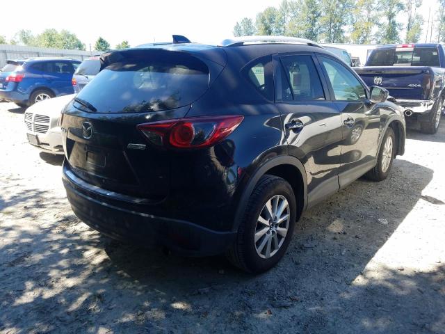 Photo 4 from auction – 2014 MAZDA CX-5 TOURI with VIN JM3KE2CY5E0360371