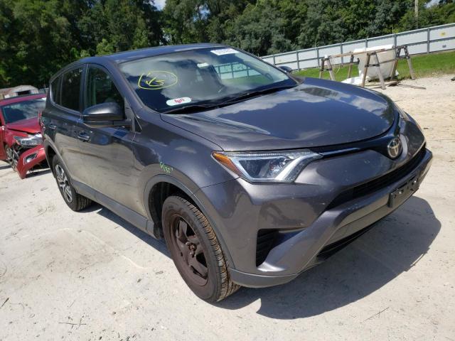 Photo 1 from auction – 2018 TOYOTA RAV4 LE with VIN 2T3ZFREV9JW445820