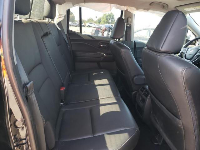 Photo 6 from auction – 2018 HONDA RIDGELINE with VIN 5FPYK3F73JB002189