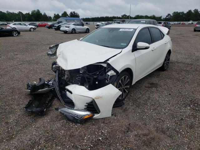 Photo 2 from auction – 2018 TOYOTA COROLLA L with VIN 5YFBURHE5JP773443