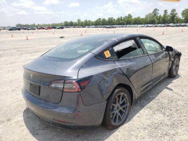 Photo 4 from auction – 2022 TESLA MODEL 3 with VIN 5YJ3E1EA6NF186190