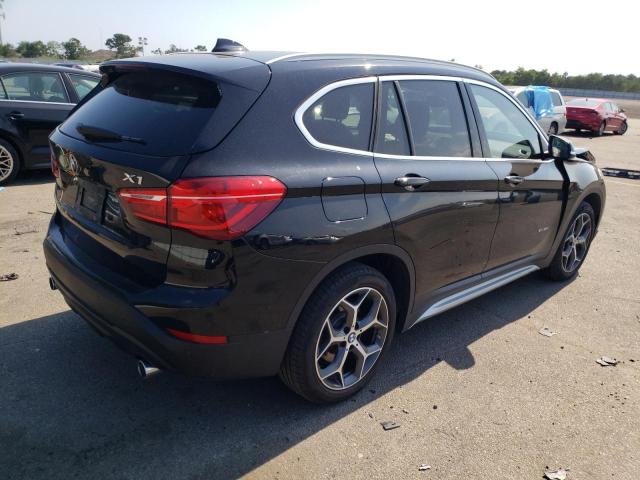 Photo 4 from auction – 2018 BMW X1 XDRIVE2 with VIN WBXHT3Z31J4A65920