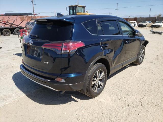 Photo 4 from auction – 2017 TOYOTA RAV4 XLE with VIN JTMWFREV4HJ717864