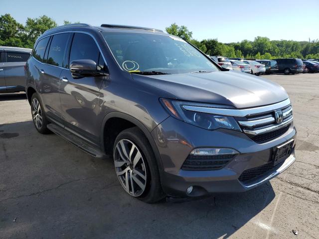 HONDA PILOT TOUR 2017 with VIN 5FNYF6H93HB097330 - Photo from auction