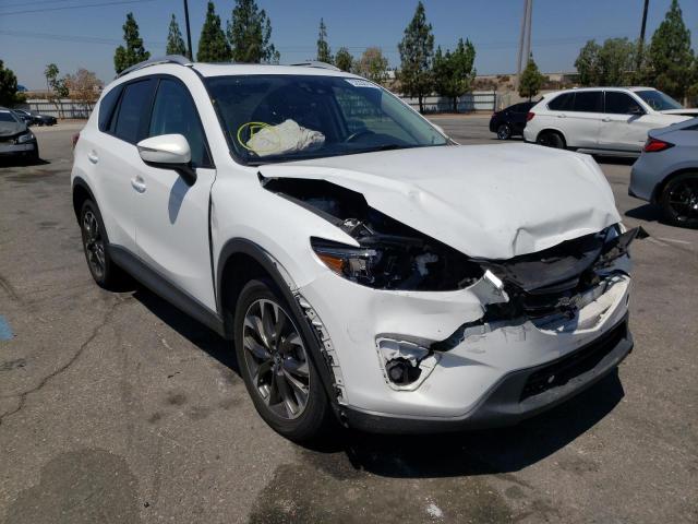 MAZDA CX-5 GT 2016 with VIN JM3KE4DY8G0689305 - Photo from auction
