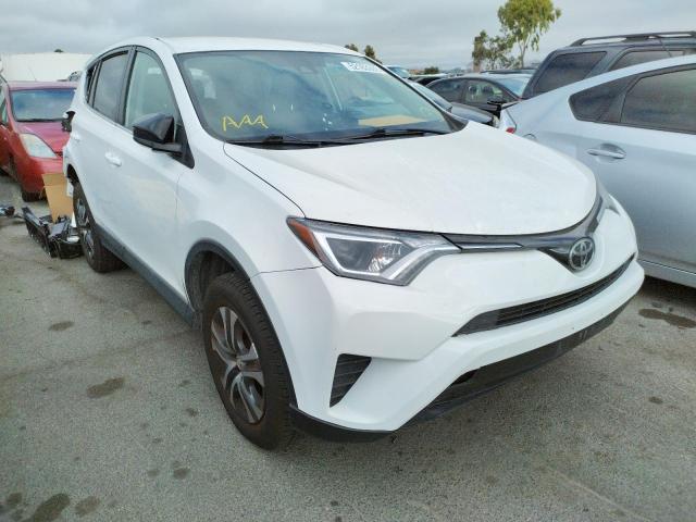TOYOTA RAV4 LE 2018 with VIN 2T3ZFREV4JW424924 - Photo from auction