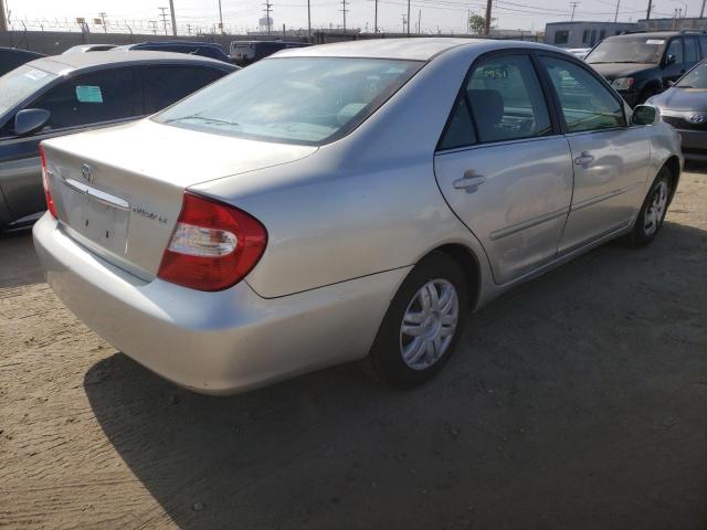 Photo 4 from auction – 2002 TOYOTA CAMRY LE with VIN JTDBE32K720086615