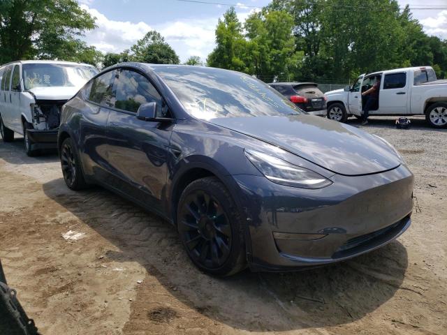 TESLA MODEL Y 2021 with VIN 5YJYGDEE5MF115324 - Photo from auction