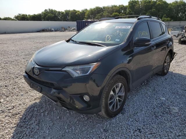 Photo 2 from auction – 2017 TOYOTA RAV4 HV LE with VIN JTMRJREV9HD108151