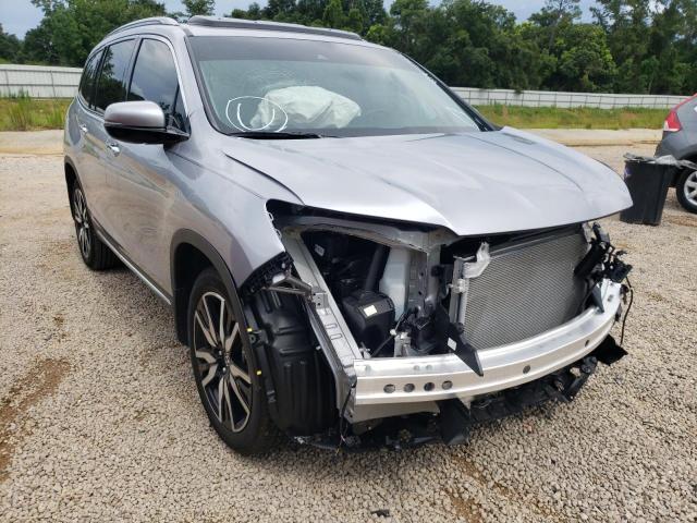 HONDA PILOT TOUR 2022 with VIN 5FNYF5H60NB004338 - Photo from auction