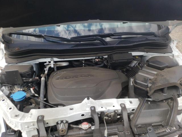Photo 7 from auction – 2021 HONDA PASSPORT E with VIN 5FNYF8H53MB009735
