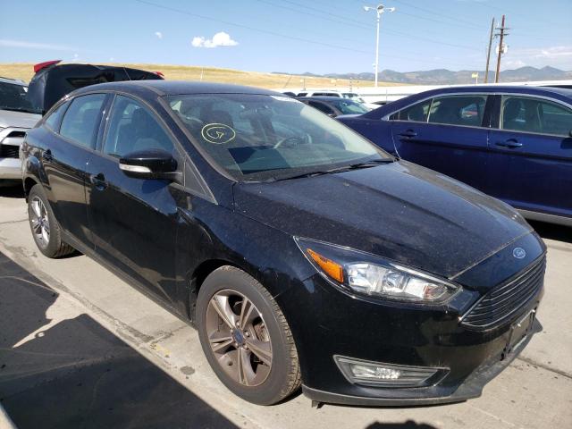 FORD FOCUS SE 2018 with VIN 1FADP3F2XJL228875 - Photo from auction