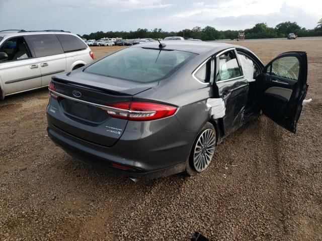 Photo 4 from auction – 2018 FORD FUSION TIT with VIN 3FA6P0RU0JR182043