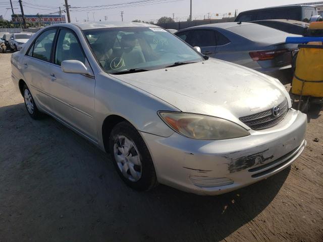 TOYOTA CAMRY LE 2002 with VIN JTDBE32K720086615 - Photo from auction
