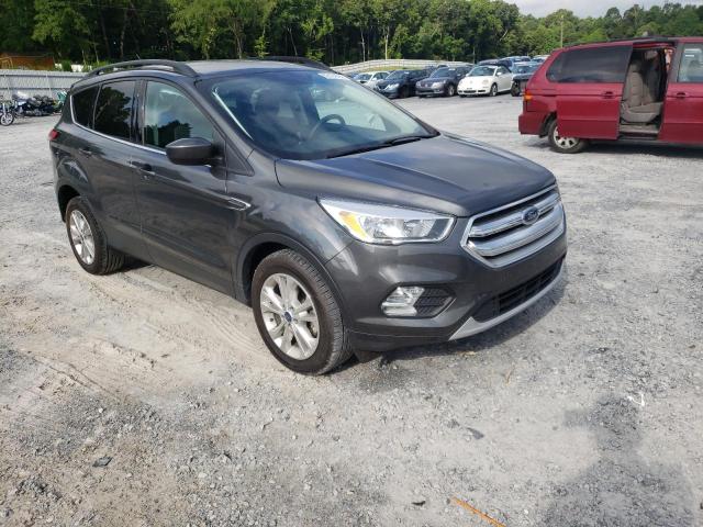 FORD ESCAPE 2018 with VIN 1FMCU0GD5JUA58086 - Photo from auction
