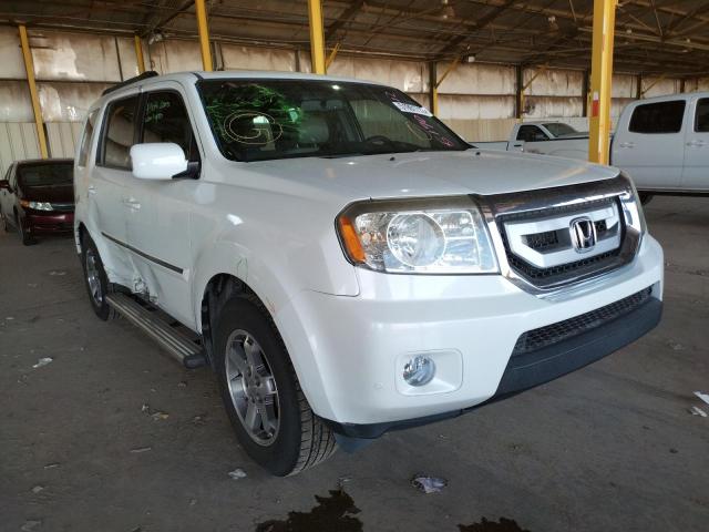 HONDA PILOT TOUR 2011 with VIN 5FNYF3H93BB051986 - Photo from auction