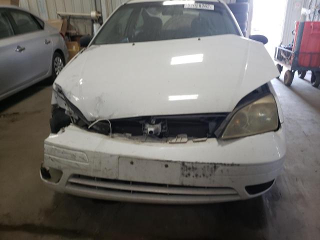 Photo 7 from auction – 2007 FORD FOCUS ZX3 with VIN 1FAFP31N97W303860