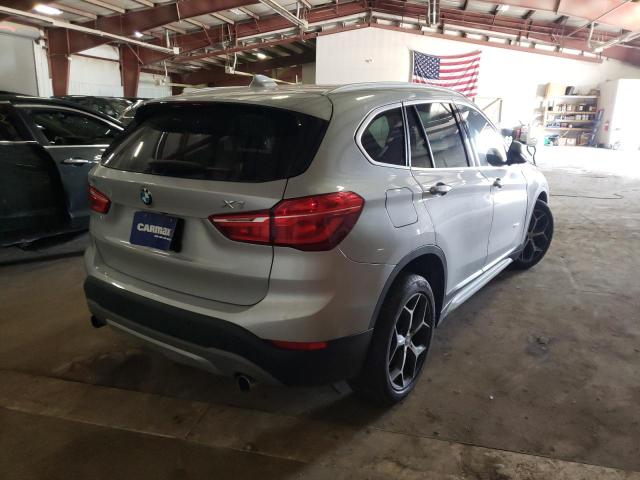 Photo 4 from auction – 2017 BMW X1 XDRIVE2 with VIN WBXHT3C30H5F84809