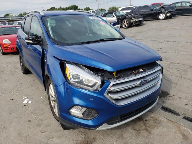 FORD ESCAPE TIT 2017 with VIN 1FMCU0JD0HUD75471 - Photo from auction