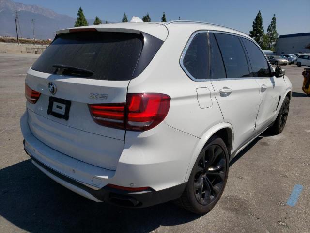 Photo 4 from auction – 2015 BMW X5 XDRIVE5 with VIN 5UXKR6C52F0J75818