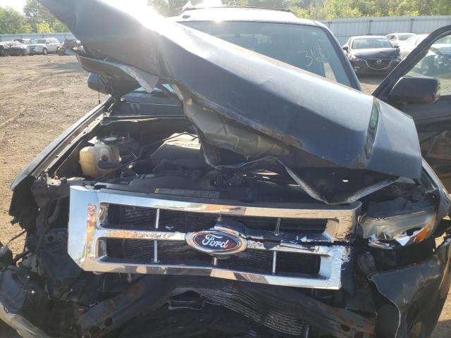 Photo 7 from auction – 2011 FORD ESCAPE LIM with VIN 1FMCU0EG7BKB32909