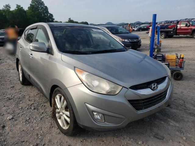 HYUNDAI TUCSON GLS 2012 with VIN KM8JUCAC4CU381959 - Photo from auction