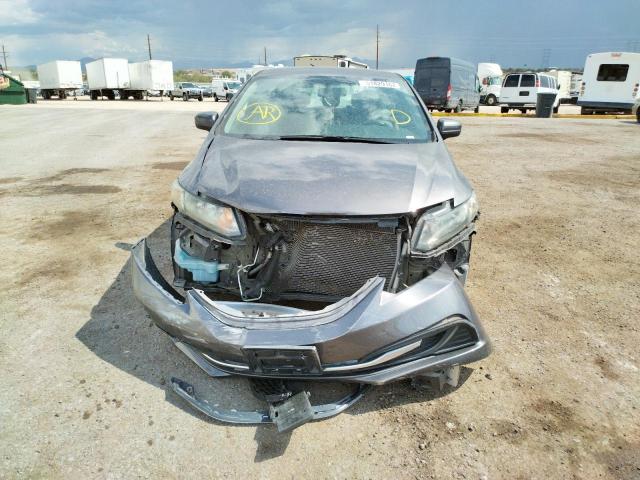 Photo 9 from auction – 2014 HONDA CIVIC LX with VIN 19XFB2F54EE026828