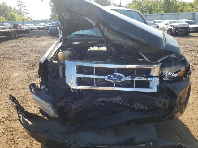 Photo 9 from auction – 2011 FORD ESCAPE LIM with VIN 1FMCU0EG7BKB32909