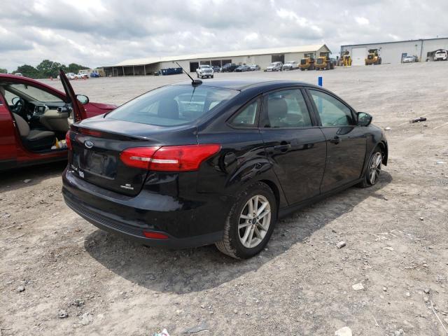 Photo 4 from auction – 2015 FORD FOCUS SE with VIN 1FADP3F28FL244502
