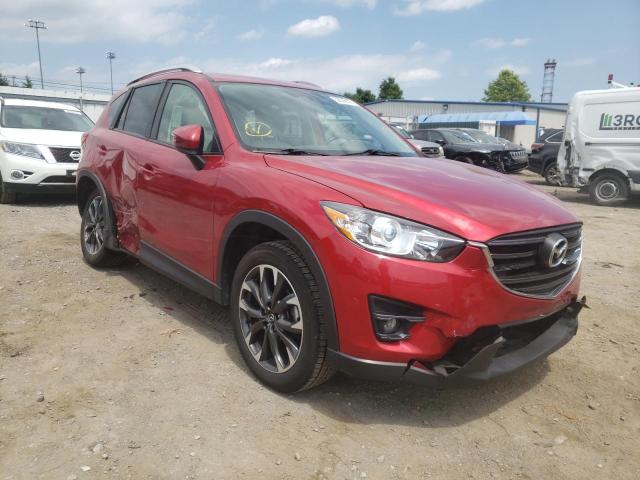 MAZDA CX-5 GT 2016 with VIN JM3KE4DY3G0891842 - Photo from auction