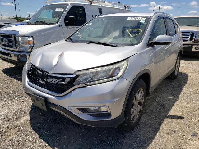 Photo 2 from auction – 2015 HONDA CR-V EXL with VIN 5J6RM4H72FL047813