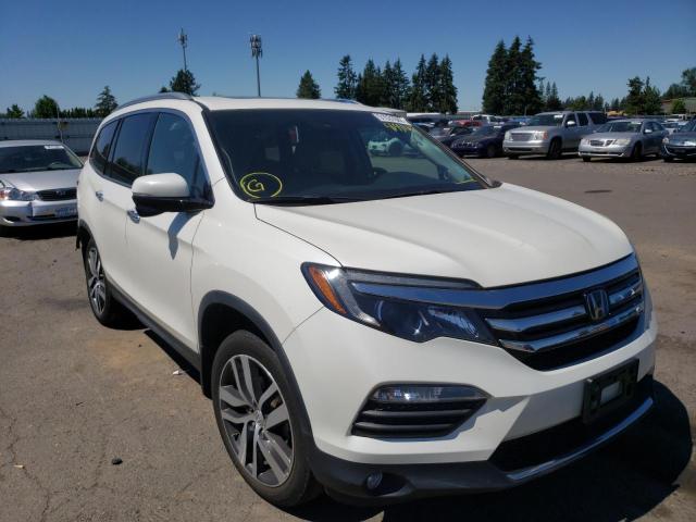 HONDA PILOT TOUR 2016 with VIN 5FNYF6H9XGB071967 - Photo from auction
